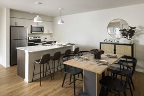 Bremerton apartment for rent - a kitchen and dining area in a 555 waverly unit