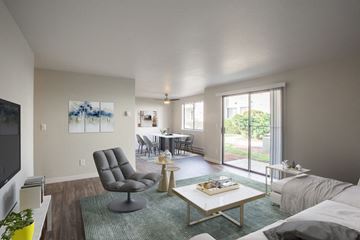 Portland apartment for rent - the living room of an apartment with a couch and a coffee table