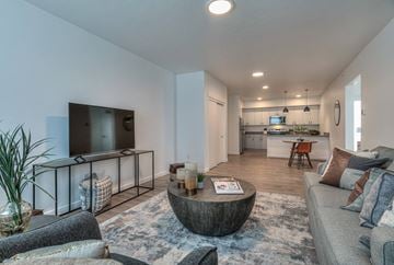 Bend apartment for rent - a living room with a couch and a tv
