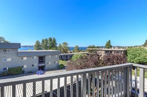 Kirkland apartment for rent - the view from the deck of a condo building overlooking the water