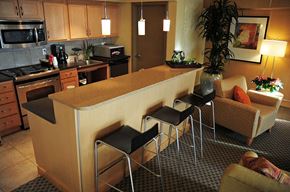 Seattle apartment for rent - A kitchen with a counter and chairs.