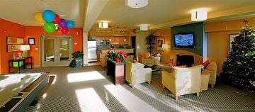 Seattle apartment for rent - A living room with a pool table and a television.