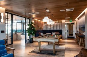 Bellevue apartment for rent - a large room with a pool table in the middle