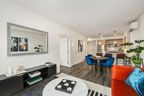 Bellevue apartment for rent - a living room and dining room with a table and chairs