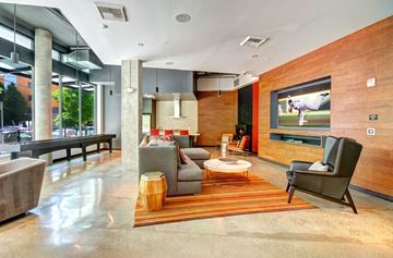 Seattle apartment for rent - the living room has a large screen tv on the wall