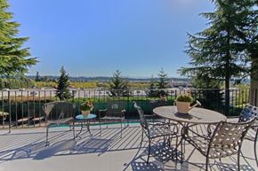 Lynnwood apartment for rent - a patio with chairs and tables and a pool