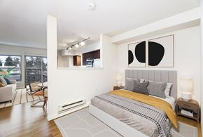 Seattle apartment for rent - a bedroom with a bed and a window