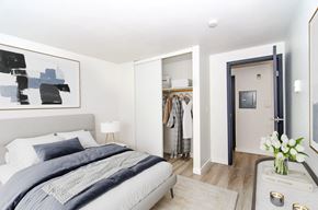 Seattle apartment for rent - a bedroom with a bed and a closet