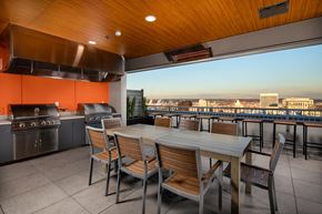 Tacoma apartment for rent - a dining area with a table and chairs and a balcony