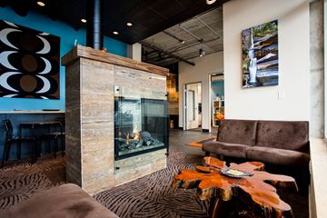 Portland apartment for rent - a living room with a fireplace and a couch