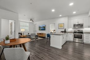Lacey apartment for rent - A modern kitchen with a dining table and chairs.
