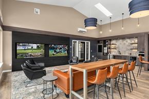 Lacey apartment for rent - A modern dining room with a large table and chairs.
