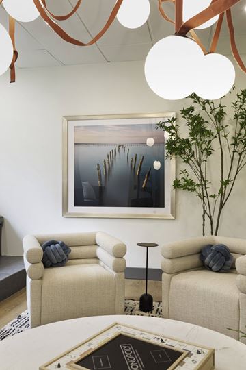 Seattle apartment for rent - A living room with a painting on the wall and two couches.