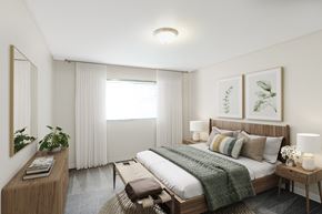 Vancouver apartment for rent - a bedroom with a bed and a desk and a window