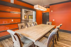 Kirkland apartment for rent - a dining room with a wooden table and chairs