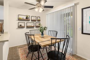 Kent apartment for rent - the residence on lamar apartment dining room with table and chairs