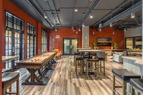 Kirkland apartment for rent - a game room with a pool table and tables