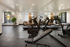 Seattle apartment for rent - a gym with weights and cardio equipment in a building