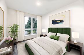 Kirkland apartment for rent - a bedroom with a bed and a large window