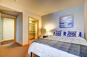 Seattle apartment for rent - the master bedroom has a king sized bed and ensuite bathroom