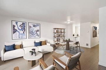 Renton apartment for rent - A living room with a white couch and a coffee table.