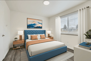 Seattle apartment for rent - a bedroom with a bed and a window