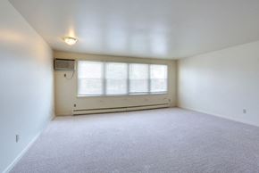 Kenmore apartment for rent - Berkley Manor Apartments - Living Room – Air Conditioning Unit – Natural Lighting - Ask for a Tour - Pet Friendly