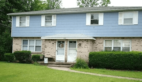 Amherst townhouse for rent - A blue house with a white door and windows.