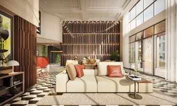 Miami apartment for rent - A modern living room with a white sofa and a black and white checkered floor.