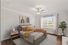 Hoschton apartment for rent - Primary Bedroom with king size bed and large window letting in nice natural light.