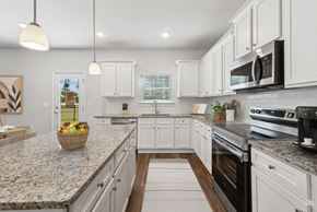 Hoschton townhouse for rent - A view of the spacious kitchen and stainless steel appliances