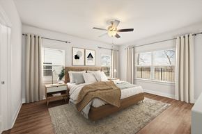 Mcdonough townhouse for rent - Serene primary suite with a plush king bed, refined finishes, and calming greenery—your private retreat for rest and relaxation.