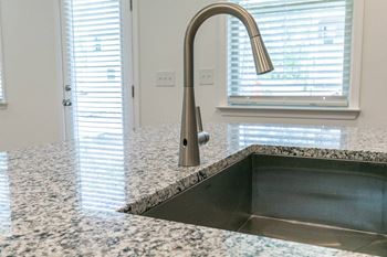 Wave sensor touchless kitchen faucet with pull down sprayer