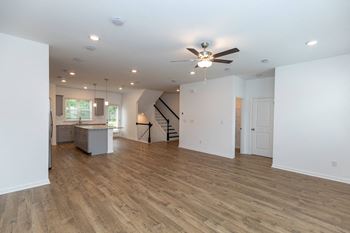Mohawk luxury plank style floors in kitchen,  living & dining areas