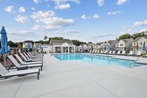 Powder Springs apartment for rent - Luxurious poolside retreat with elegant seating.
