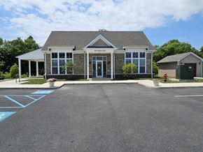 Medford apartment for rent - a building with a parking lot in front of it