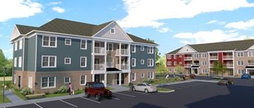 Annapolis apartment for rent - A rendering of a modern apartment complex with a parking lot in front.