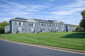 Leavenworth apartment for rent - A row of houses with green lawns in front.