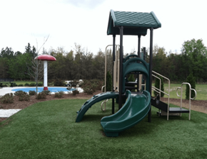 Cordele apartment for rent - a playground with a swing set and a pool