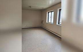 Rockford apartment for rent - an empty room in a building with two windows