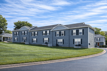 Leavenworth apartment for rent - A row of houses with a curved driveway in front.