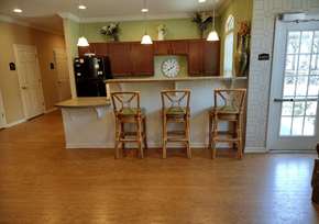 Dublin apartment for rent - a kitchen with a counter and three bar stools