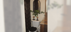 El Paso apartment for rent - A white toilet with a black seat cover sits next to a sink in a bathroom.