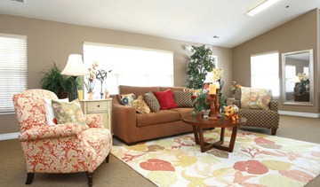 Richmond apartment for rent - a living room filled with furniture and a large rug