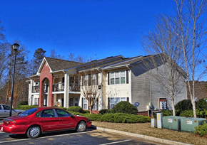 Blairsville apartment for rent - a red car parked in front of a house