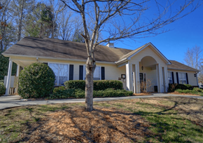 Blairsville apartment for rent - a white house with a tree in front of it