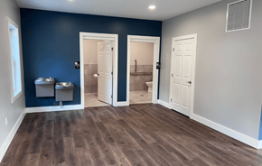 Rockford apartment for rent - a empty room with two doors and a bathroom