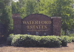 Dublin apartment for rent - a sign for waterford estates in front of trees