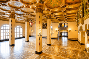 Little Rock apartment for rent - A large room with a stone floor and ornate ceiling.