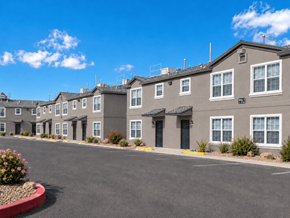 El Paso apartment for rent - A row of townhouses with a clear blue sky above.